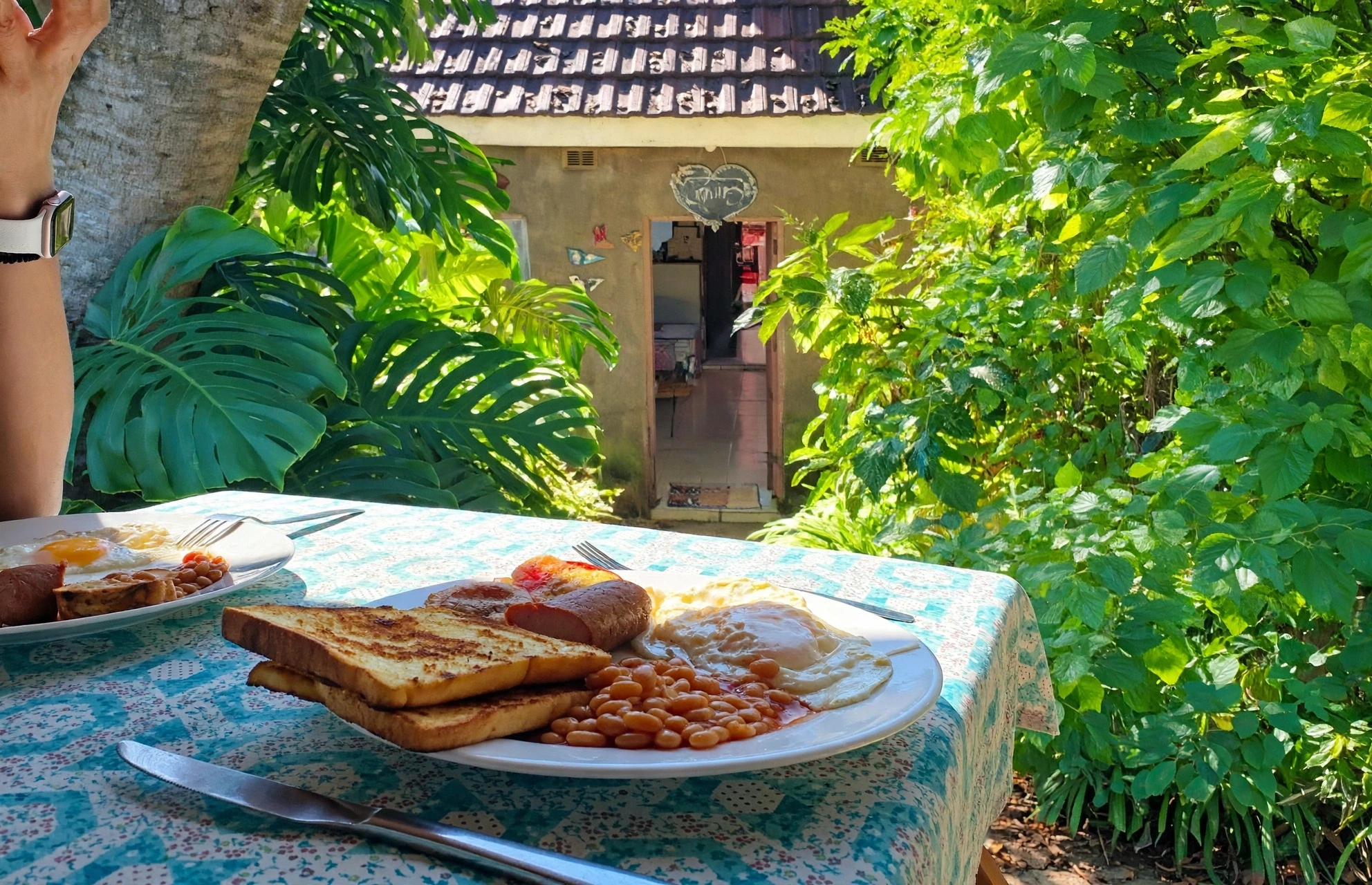 Abundant home-cooked breakfast arranged on a rustic table